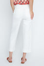 Person wearing white pants and a red patterned top on a white background