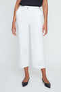 Person wearing white pants on a plain background