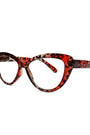 Red and black tortoiseshell eyeglasses on a white background
