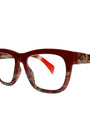 Red and multicolored eyeglasses on a white background