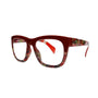 Red and multicolored eyeglasses on a white background