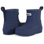 Pair of navy blue rubber boots with a brand label on a white background