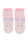 Pair of baby socks with bunny design on a white background