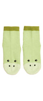 Pair of green socks with frog faces on a white background