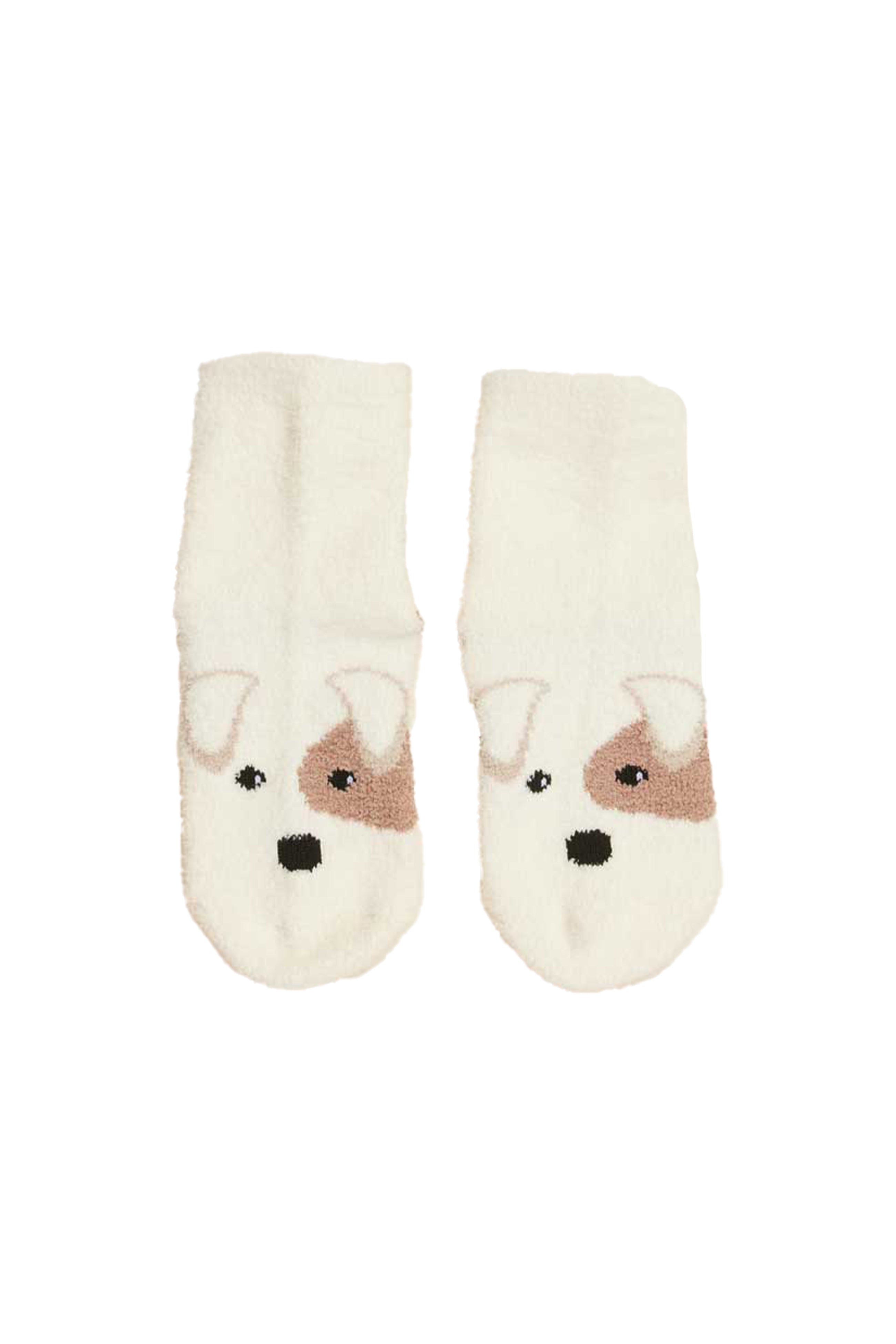 Pair of cream socks with dog face design on a white background