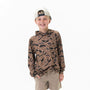 Child wearing a camouflage hoodie and beige cap on a white background