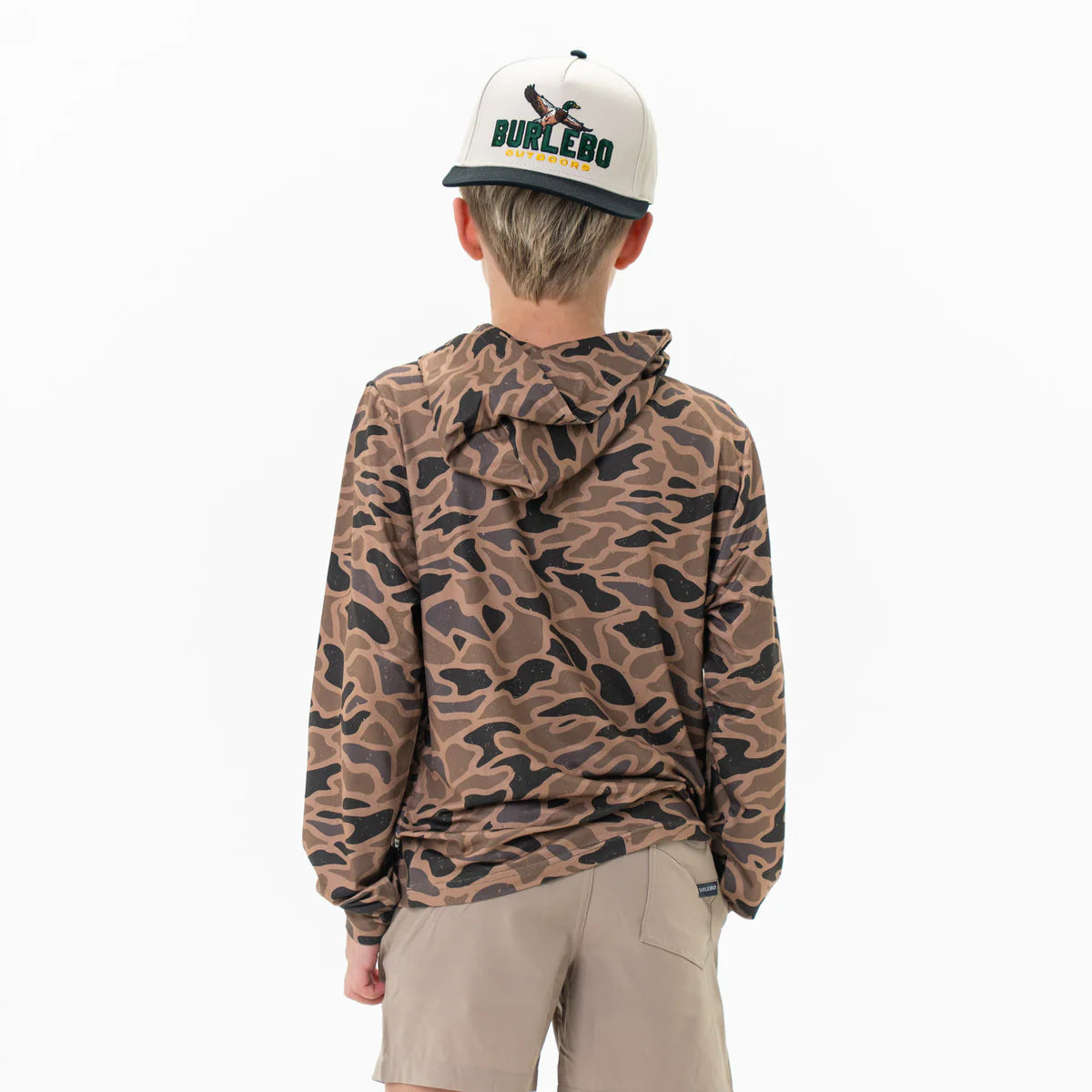 Person wearing a camouflage hoodie and a cap with 'Burlebo' branding on a white background