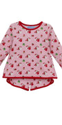 A children's long-sleeve pajama top in light pink with a repeating Santa Claus and gift print, finished with red trim on the collar, cuffs, and hem.