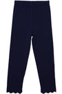 Navy blue knit pants with a scalloped hem, shown flat against a white background.