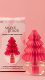 Pink honeycomb diffuser with packaging on a pink background