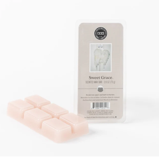 Scented wax bars with packaging labeled 'Sweet Grace' on a white background