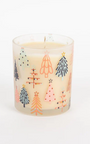 Candle with Christmas tree design on a white background
