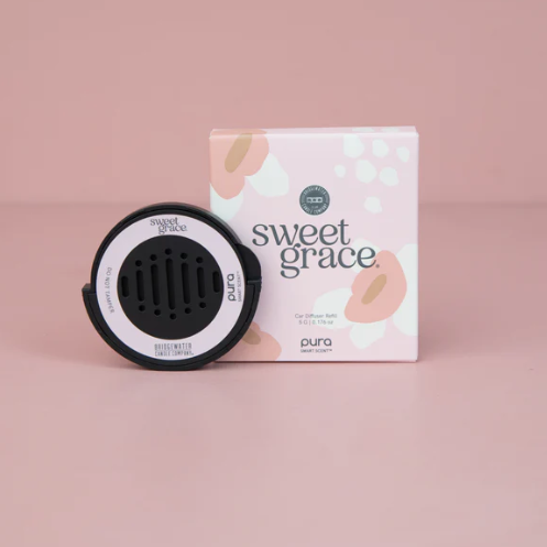 Car air freshener and packaging with 'sweet grace' branding on a pink background