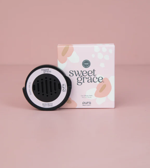 Car air freshener and packaging with 'sweet grace' branding on a pink background