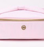 Pink cosmetic bag with gold zipper on a white background