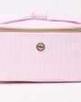 Pink striped cosmetic bag with gold zipper on a white background