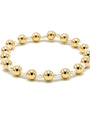 Gold beaded bracelet on a white background