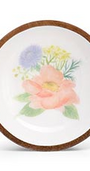 Decorative bowl with floral design on a white background