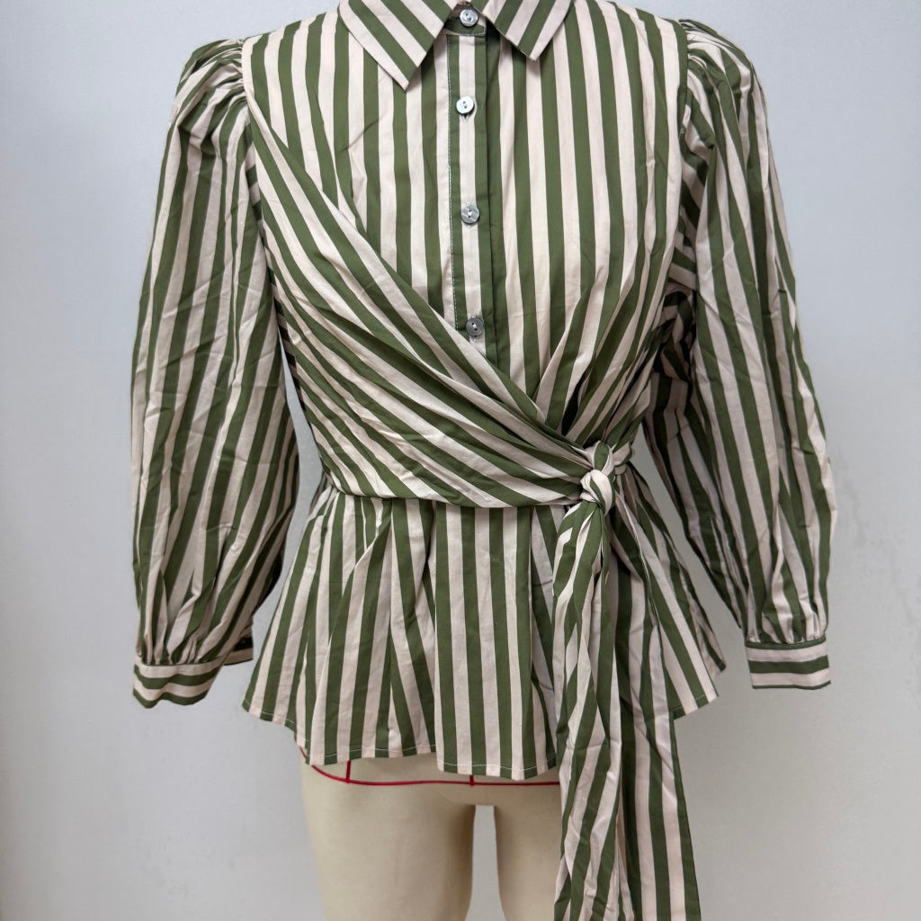 A green and off-white vertically striped wrap blouse with puff sleeves, displayed on a beige mannequin torso against a plain light gray background.