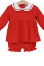 Red baby outfit with white collar on a hanger against a white background