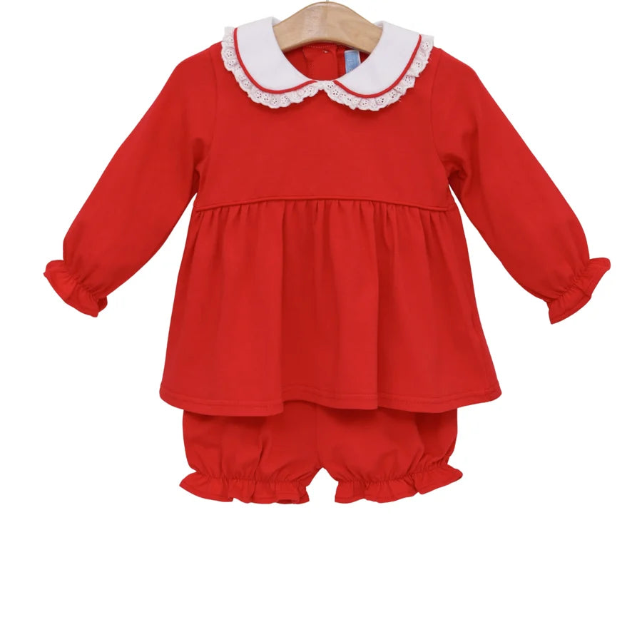 Red baby outfit with white collar on a hanger against a white background