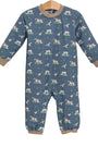 A baby long-sleeve footless one-piece jumpsuit in slate blue, featuring a repeating pattern of dogs, cats, and birds, with tan ribbed cuffs and hem, hanging on a wooden hanger against a white background.