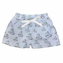 Children's shorts with sailboat pattern on a light blue background