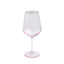 Clear wine glass with pink base and gold rim on a white background