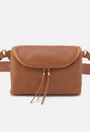 Brown leather waist bag with a strap on a white background