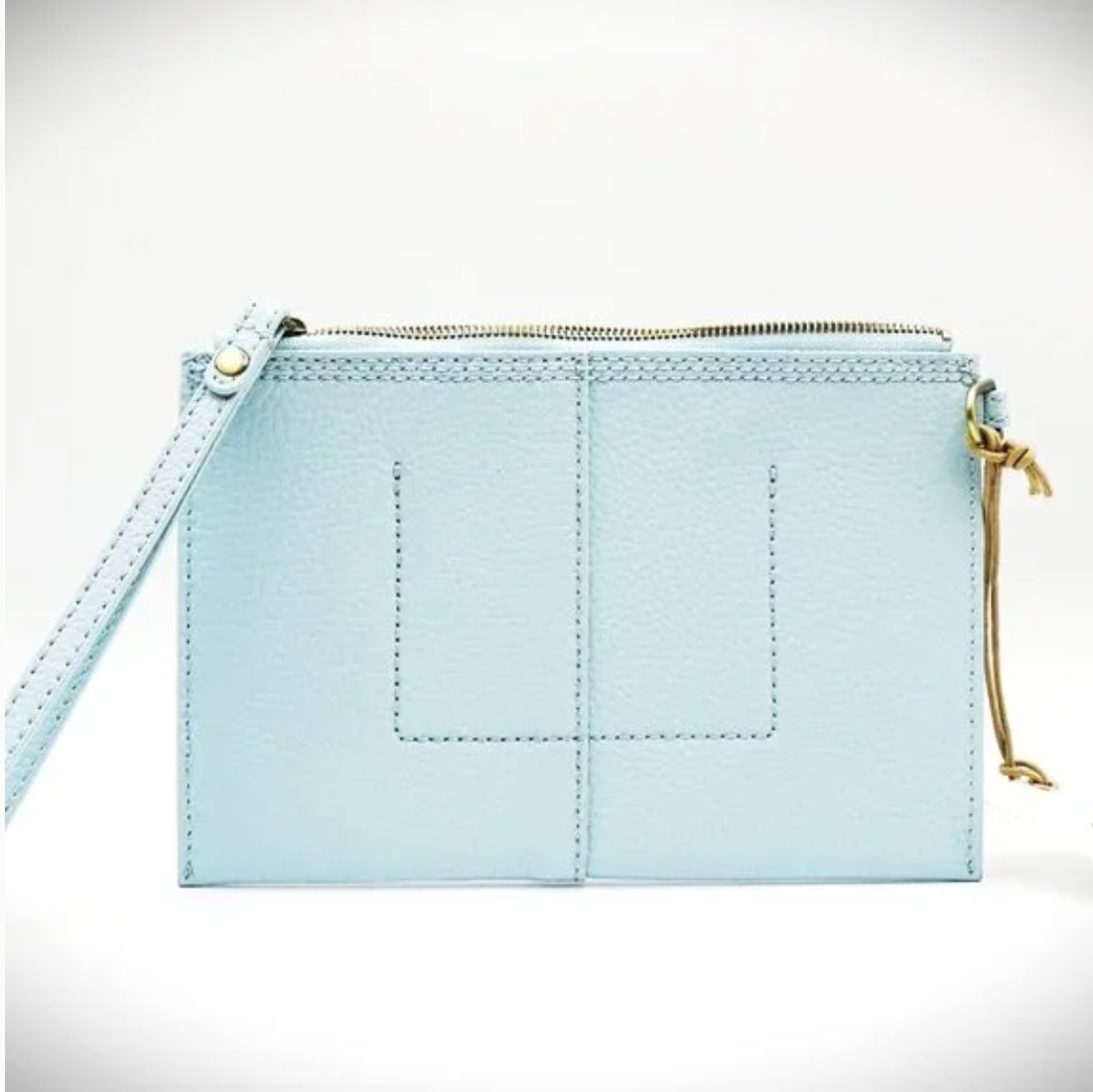 Light blue wristlet with a strap on a white background