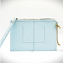 Light blue wristlet with a strap on a white background