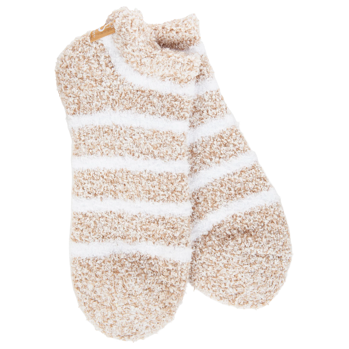 Pair of beige and white striped socks on a white background