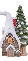 Small snowy cabin with a tree next to it on a white background