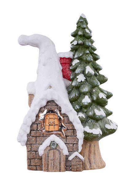 Small snowy cabin with a tree next to it on a white background