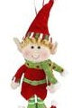 A small elf Christmas ornament with a red hat, green outfit, and red shoes, hanging against a plain white background.