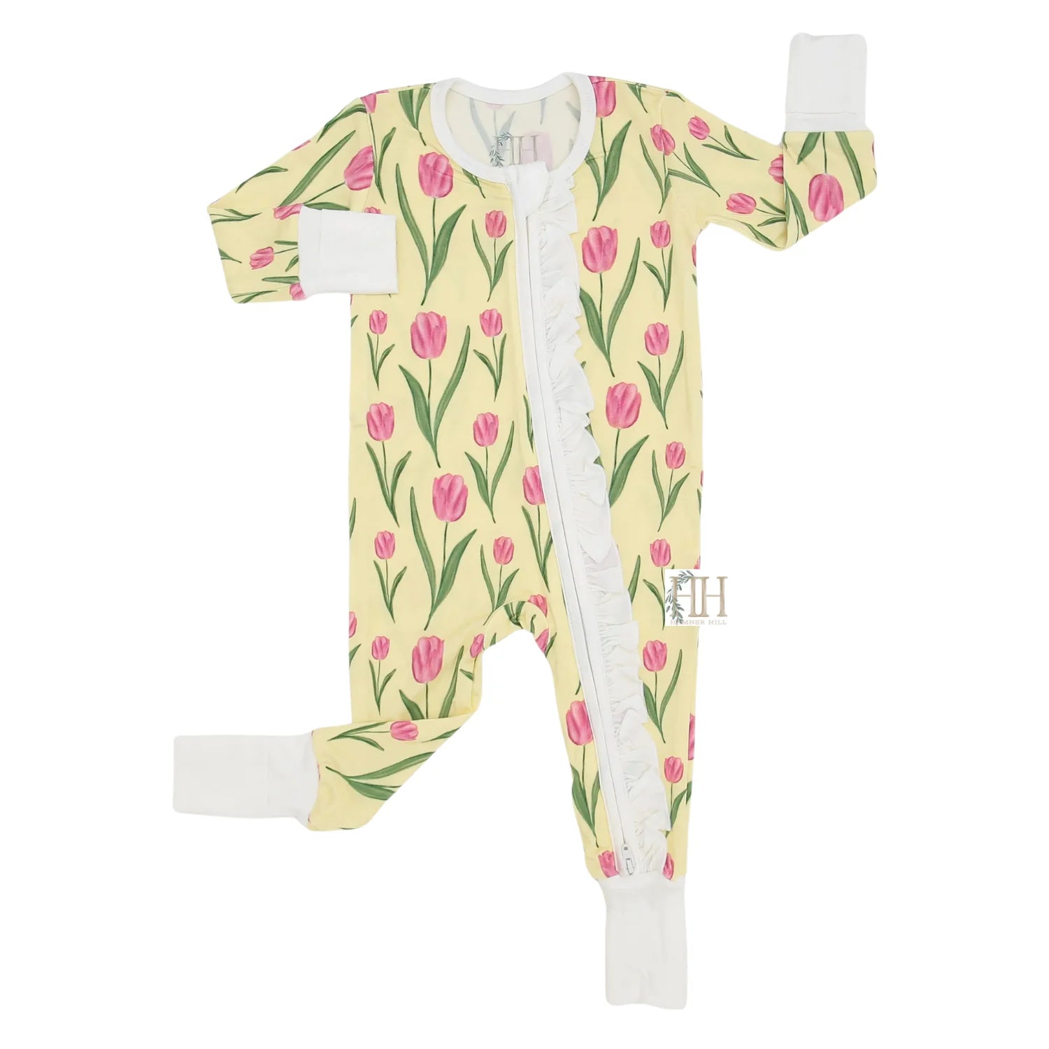 Floral patterned baby onesie with a zipper on a white background
