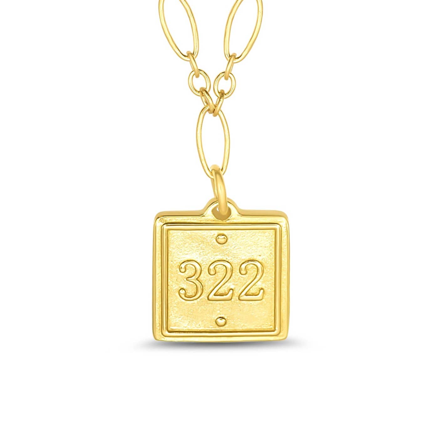 Gold pendant with the number 322 on a white background
