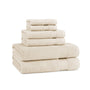 Stack of beige towels on a white background