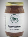 Jar of fig preserves with a visible label on a gray background