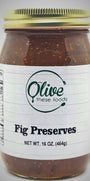 Jar of fig preserves with a visible label on a gray background