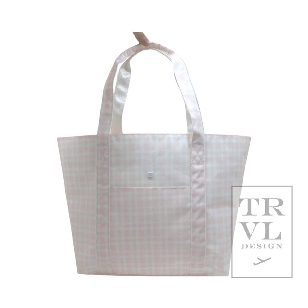 White tote bag with a subtle pink pattern on a white background, featuring the TRVL Design logo.