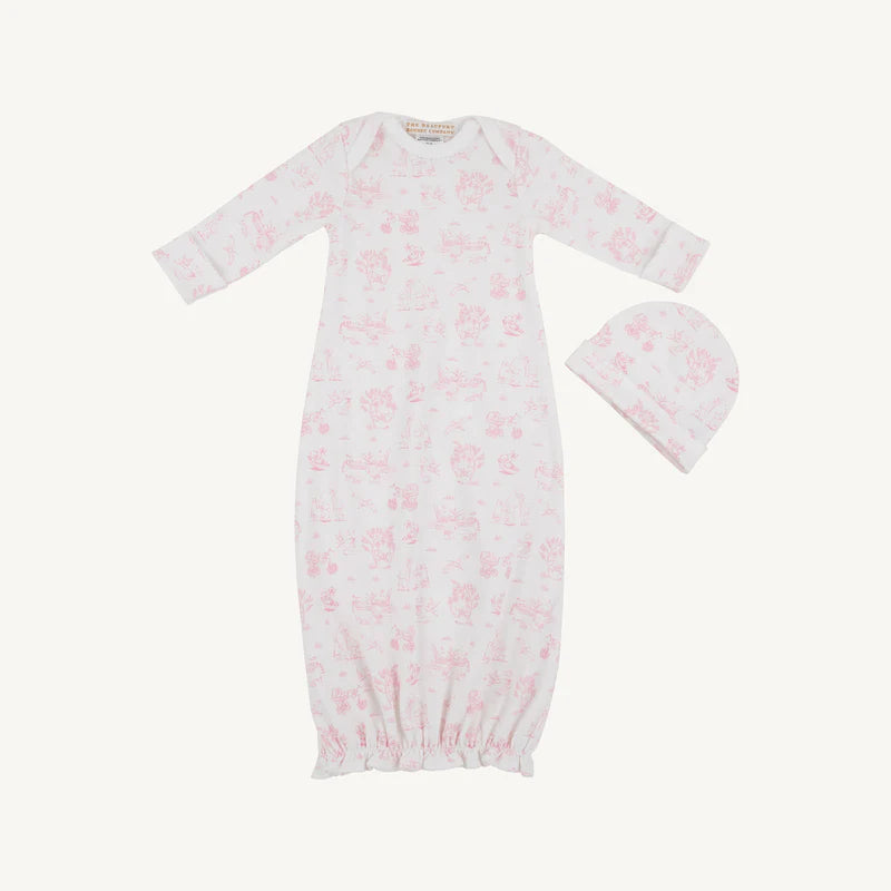 Baby gown and hat set with pink floral pattern on a white background