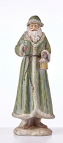 Antique resin Santa figurine holding a lantern, green robe with textured trim.