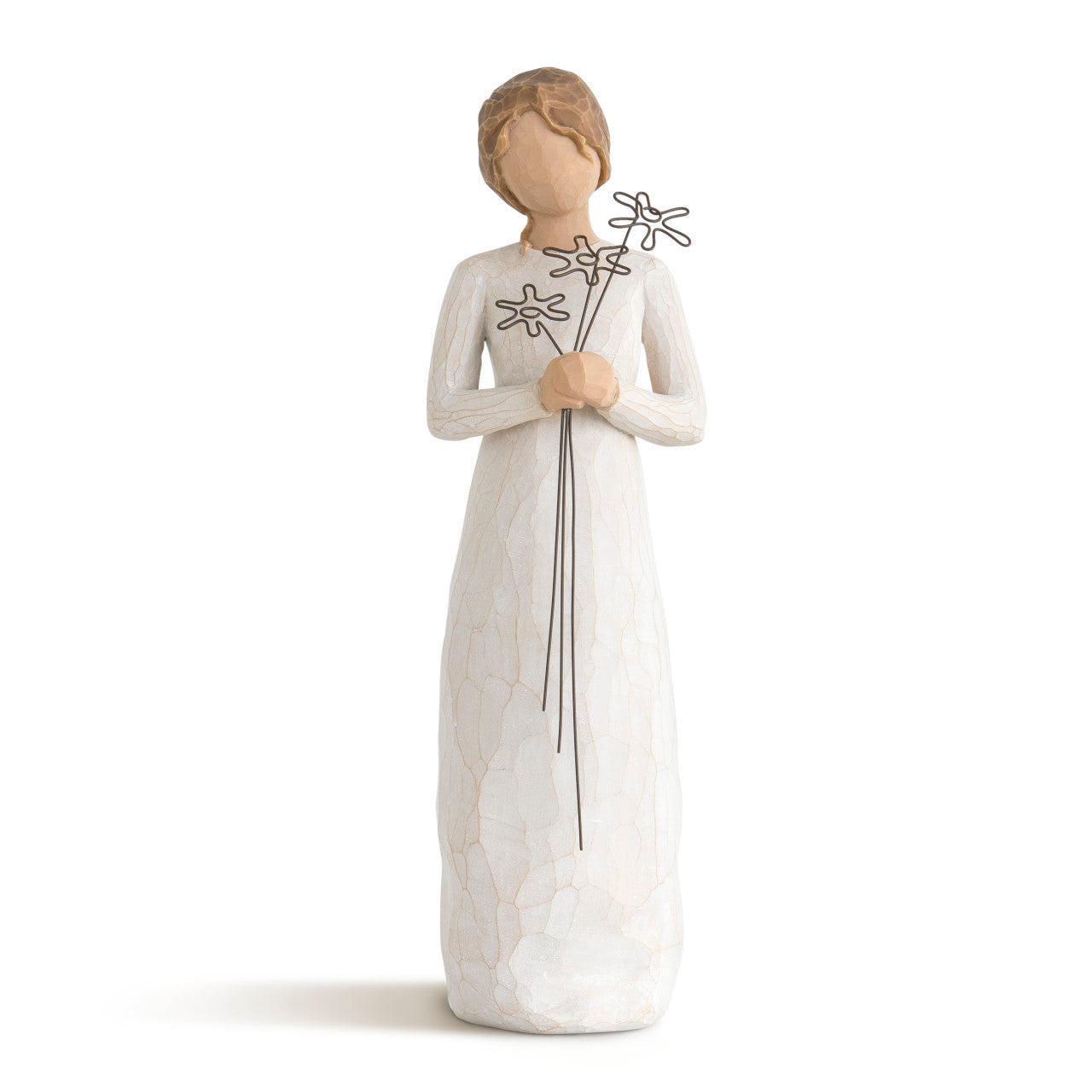 White figurine of a woman holding flowers on a white background