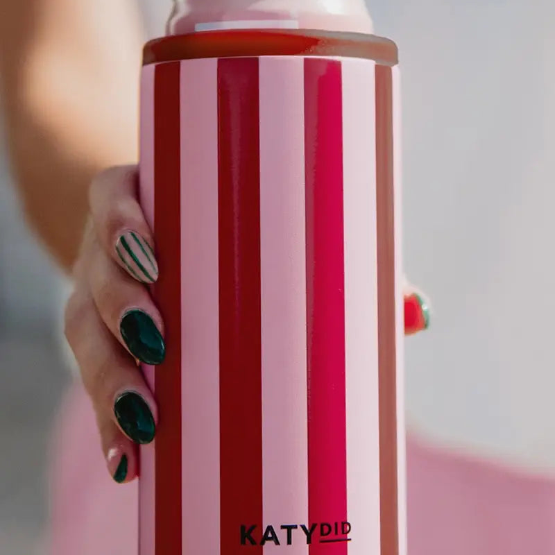Pink and wine striped can cooler with lid; side handle ring and KATYDID logo
