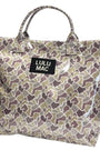 Patterned tote bag with 'LULU MAC' label on a white background