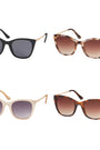 Four pairs of sunglasses with different frame colors and gradient lenses on a white background.