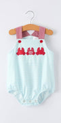 Striped baby romper with red crab design on a hanger against a white background