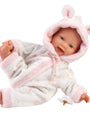 Baby doll in a pink and white outfit with a hood on a white background