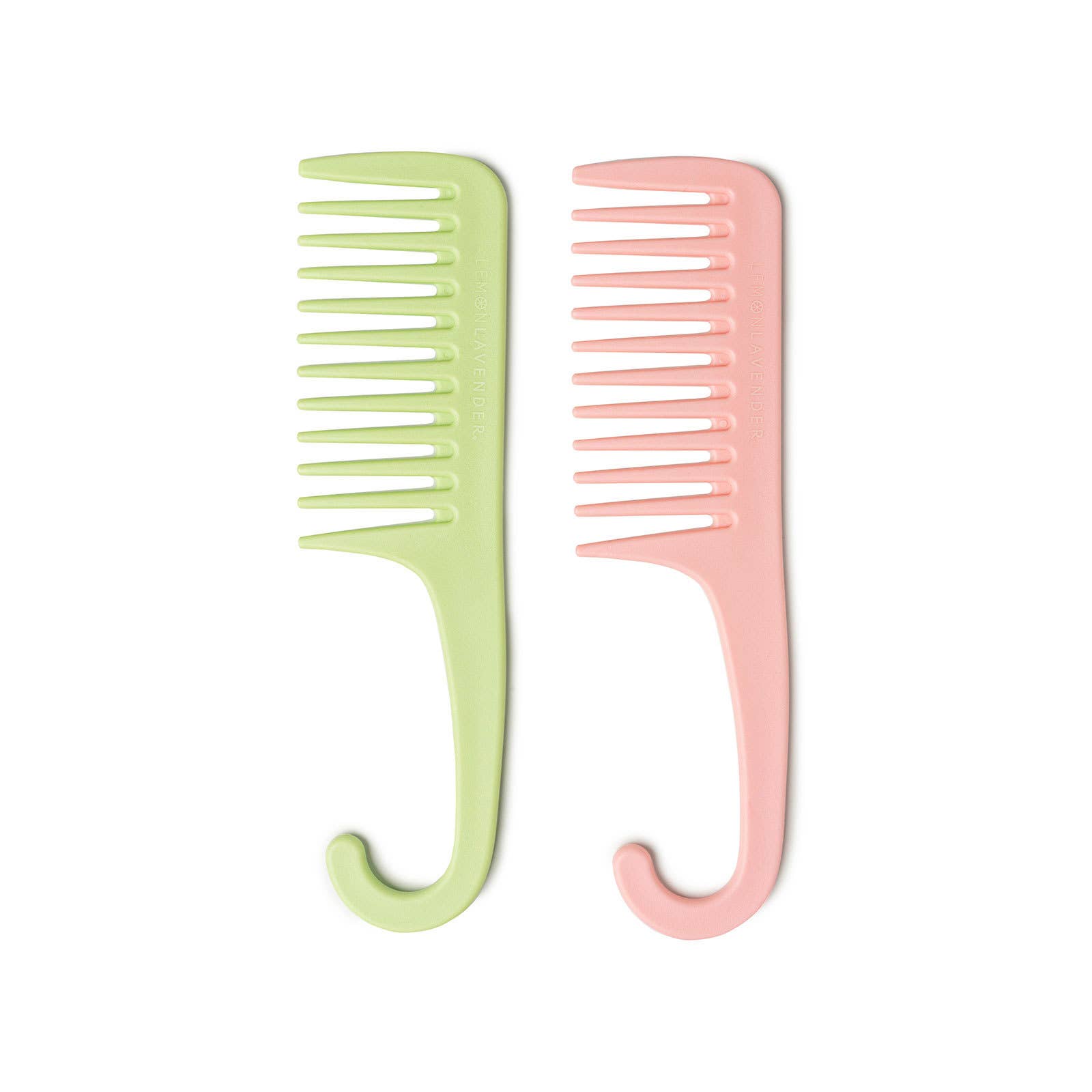Two combs, one green and one pink, on a white background